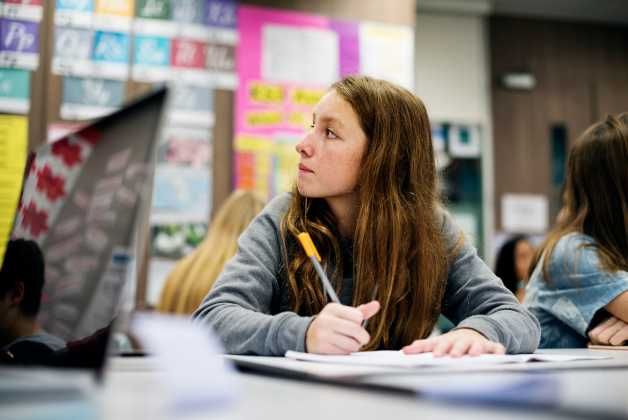 female_student_classroom_0.jpg